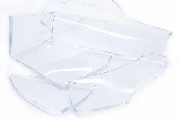 Pieces of smashed glass on white — Stock Photo, Image