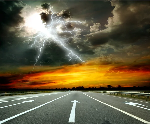 Road and lightning — Stock Photo, Image