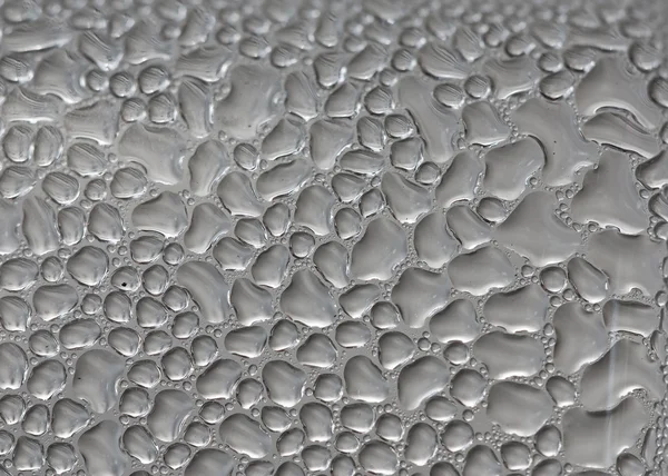 Gotas de água na superfície do vidro . — Fotografia de Stock