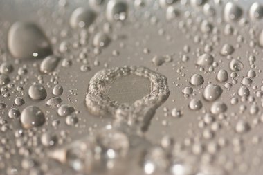 Water droplets on metal surfaces. clipart