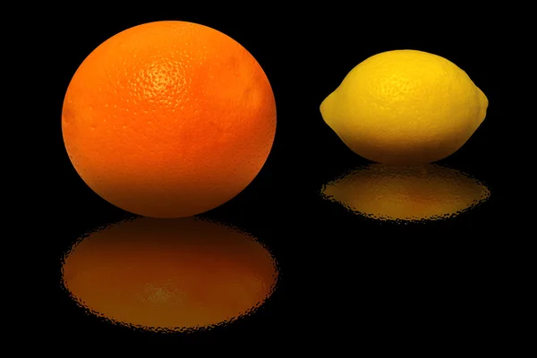 Naranja y limón sobre fondo negro —  Fotos de Stock