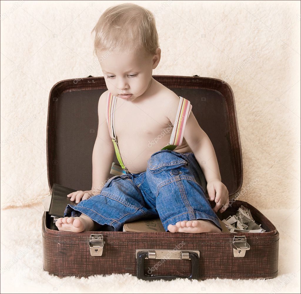 Child and suitcase