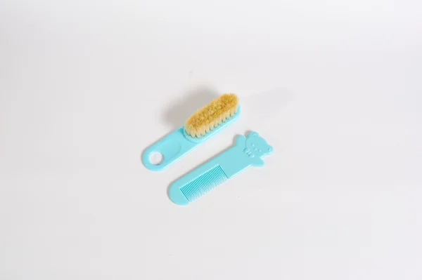 Kartáček na zuby a kartáč na vlasy — Stock fotografie