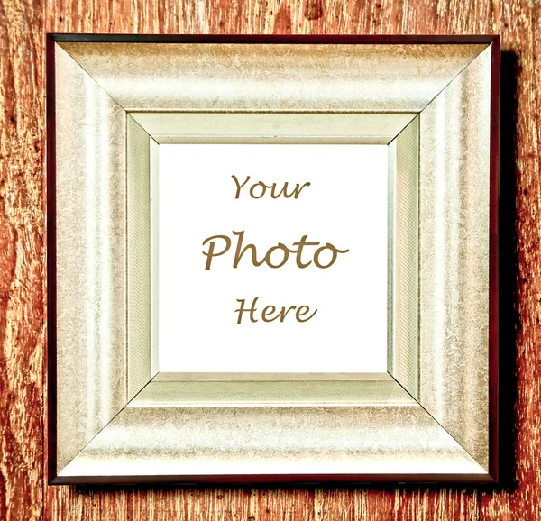 The Vintage blank of frame on wood background — Stock Photo, Image