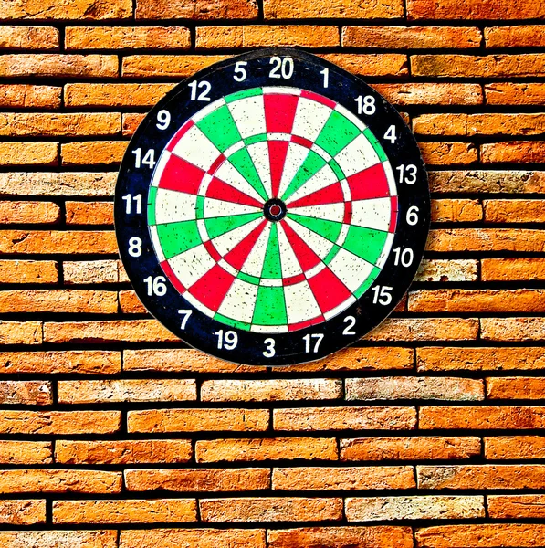 The Dartboard on brick wall — Stock Photo, Image