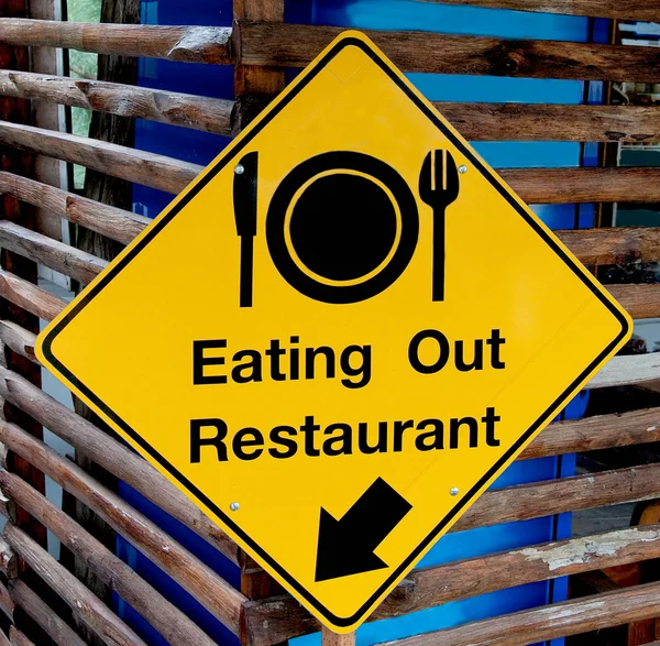 The Yellow plate post of eating out restaurant — Stock Photo, Image