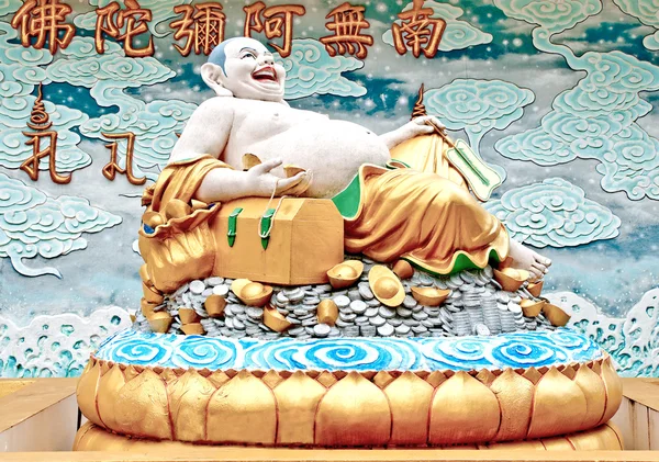 Leende buddha status för joss house — Stockfoto