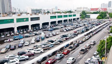 The Views of many car at park near skytrain station,bangkiok,Tha clipart