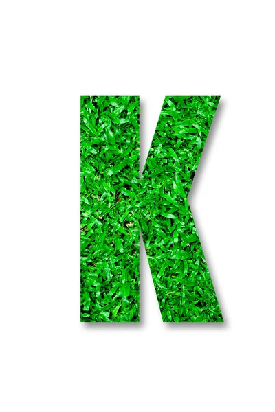O alfabeto de grama verde de k isolado no fundo branco — Fotografia de Stock