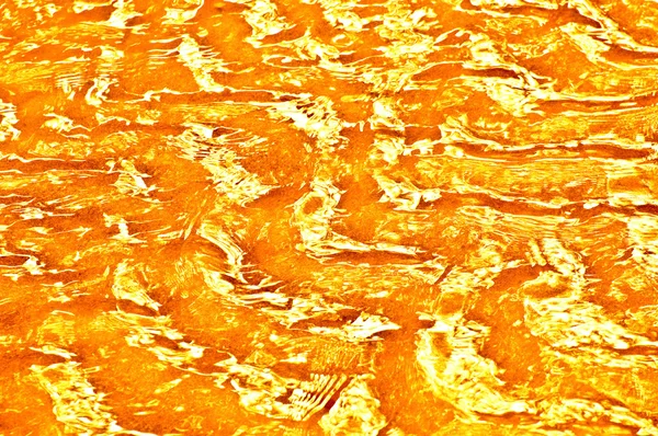 Tekstury brązowy wody falistego — Zdjęcie stockowe