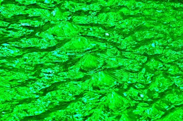 The Texture of green rippled water — Stock Photo, Image