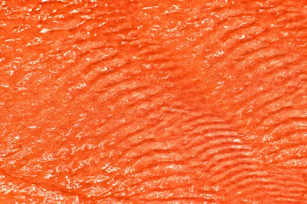 Strukturen på röda krusade vatten — Stockfoto