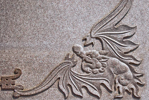 The Carving dragon on rock — Stock Photo, Image