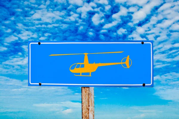 The Sign helicopter isolated on blue sky background — Stock Photo, Image