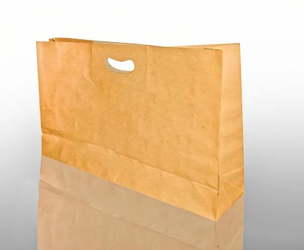 The Paper bag isolated on reflect background — Stock Photo, Image