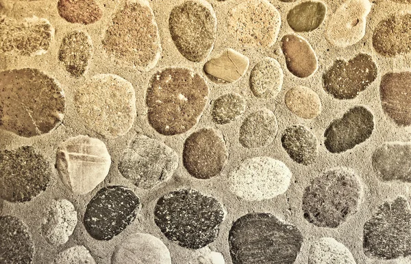 Der Felsen auf dem Hintergrund der Wand — Stockfoto