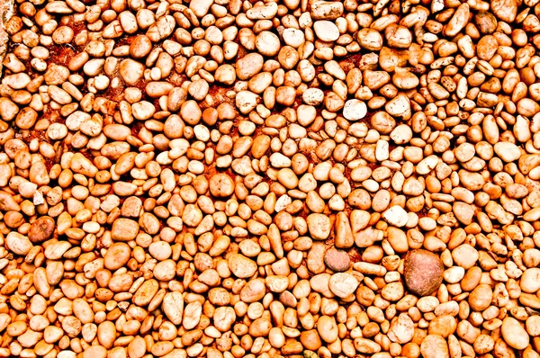 La textura de fondo de guijarro marrón — Foto de Stock