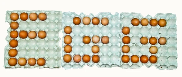 白い背景で隔離の新鮮な卵の大型トレイ — ストック写真