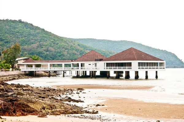 The Modern building on sand beach — Stock Photo, Image