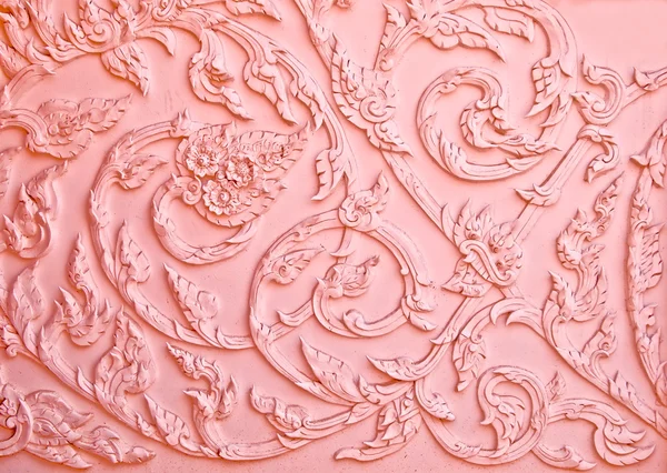 Projekt różowy stiuk rodzimych tajskim stylu na ścianie — Zdjęcie stockowe