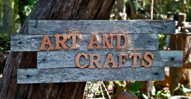 The Word of art and crafts on old wood clipart