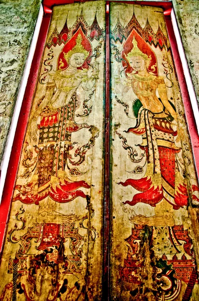 Die Kunst der thailändischen Malerei an der Holztür im Tempel — Stockfoto