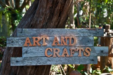 The Word of art and crafts on old wood clipart