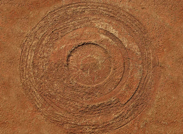 Den gamla spår cirkeln på sandsten bakgrund — Stockfoto