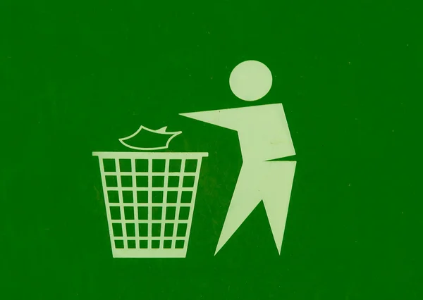 Le signe de jeter les déchets dans la poubelle — Photo