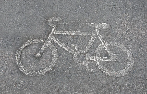 La señal de tráfico de la bicicleta pintada en el pavimento —  Fotos de Stock