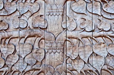 The Carving wood of pattern leaf poh tree clipart