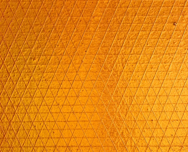 La textura dorada de la hoja refleja — Foto de Stock