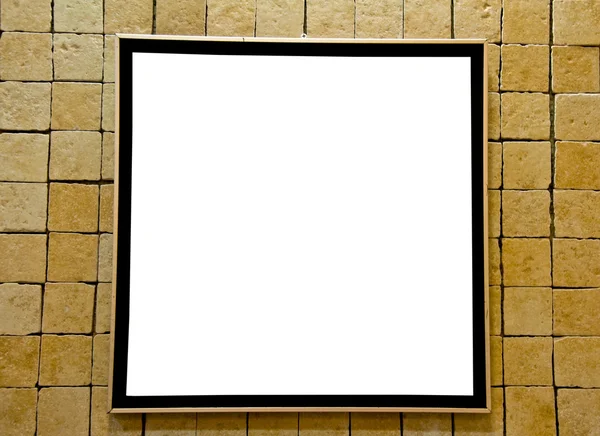 La cornice bianca sul muro di mattoni — Foto Stock