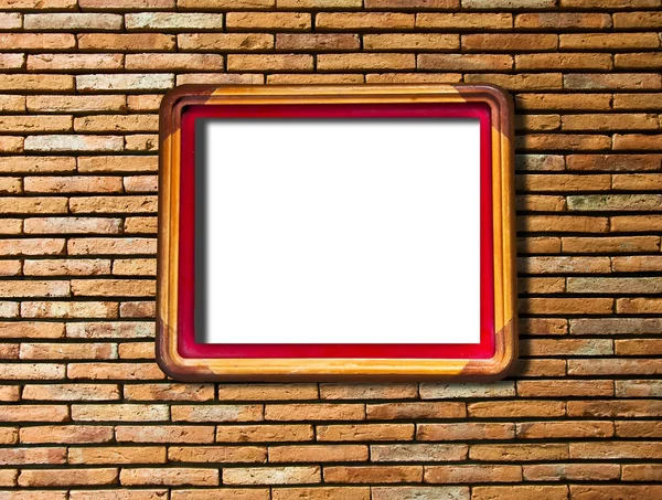 De houten frame geïsoleerd bakstenen muur achtergrond — Stockfoto