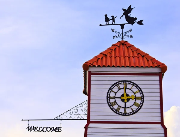Angle and kids - weathervane on the top of roof — Stock Photo, Image