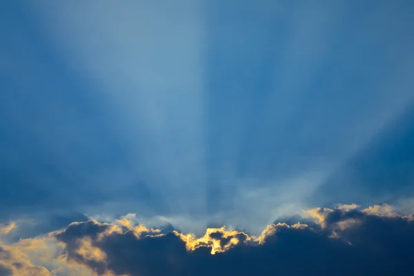 stock image Sun ray behind cloud