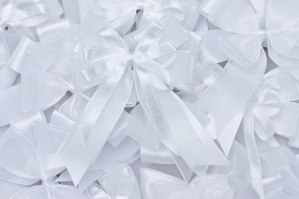 Stack of white fabric bow — Stock Photo, Image