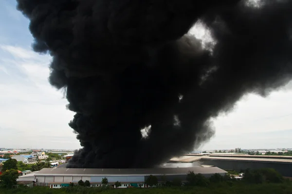 Fire burning and black smoke over cargo — Stock Photo, Image
