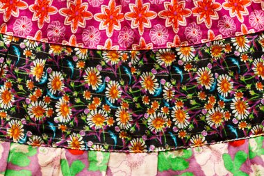 Texture of colorful cloth on woman dress in Thai style