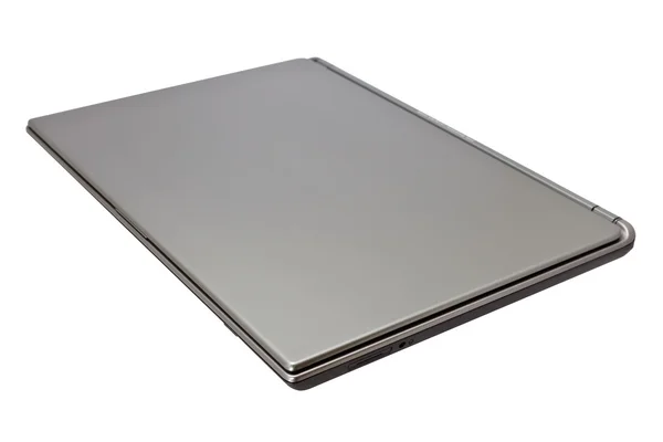 stock image Closed notebook computer on white background