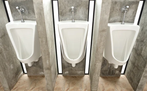 Sanitary ware in men's restroom
