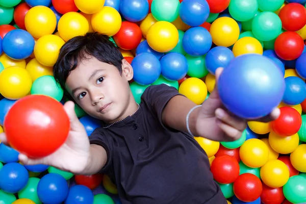 stock image Asian boy and colorful small ball