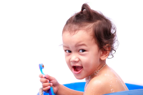 Baby und Zahnbürste — Stockfoto