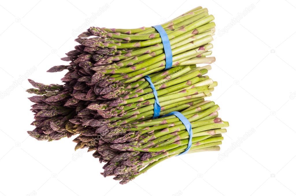 Group of fresh asparagus bundles