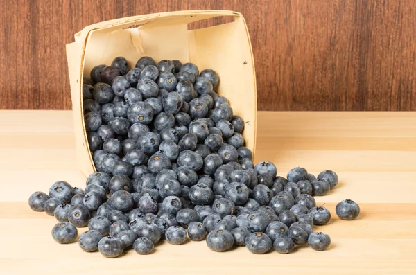 Blueberries in wooden container — Stock Photo, Image