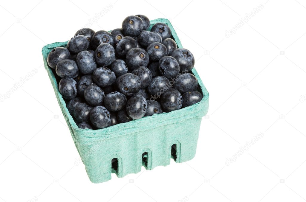 Blueberries in green container isolated