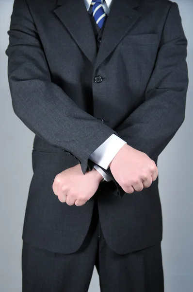 Businessman with hands crossed — Stock Photo, Image