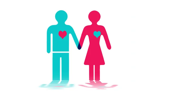 Blaue und rosa Figuren eines Mannes und einer Frau, die sich an den Händen halten — Stockfoto
