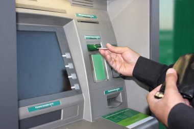 Transaction at an ATM clipart
