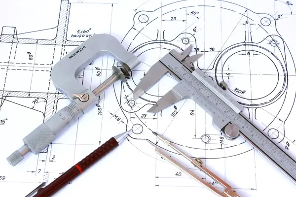 Mikrometr, třmen, tužka a kompas na modrotisk — Stock fotografie